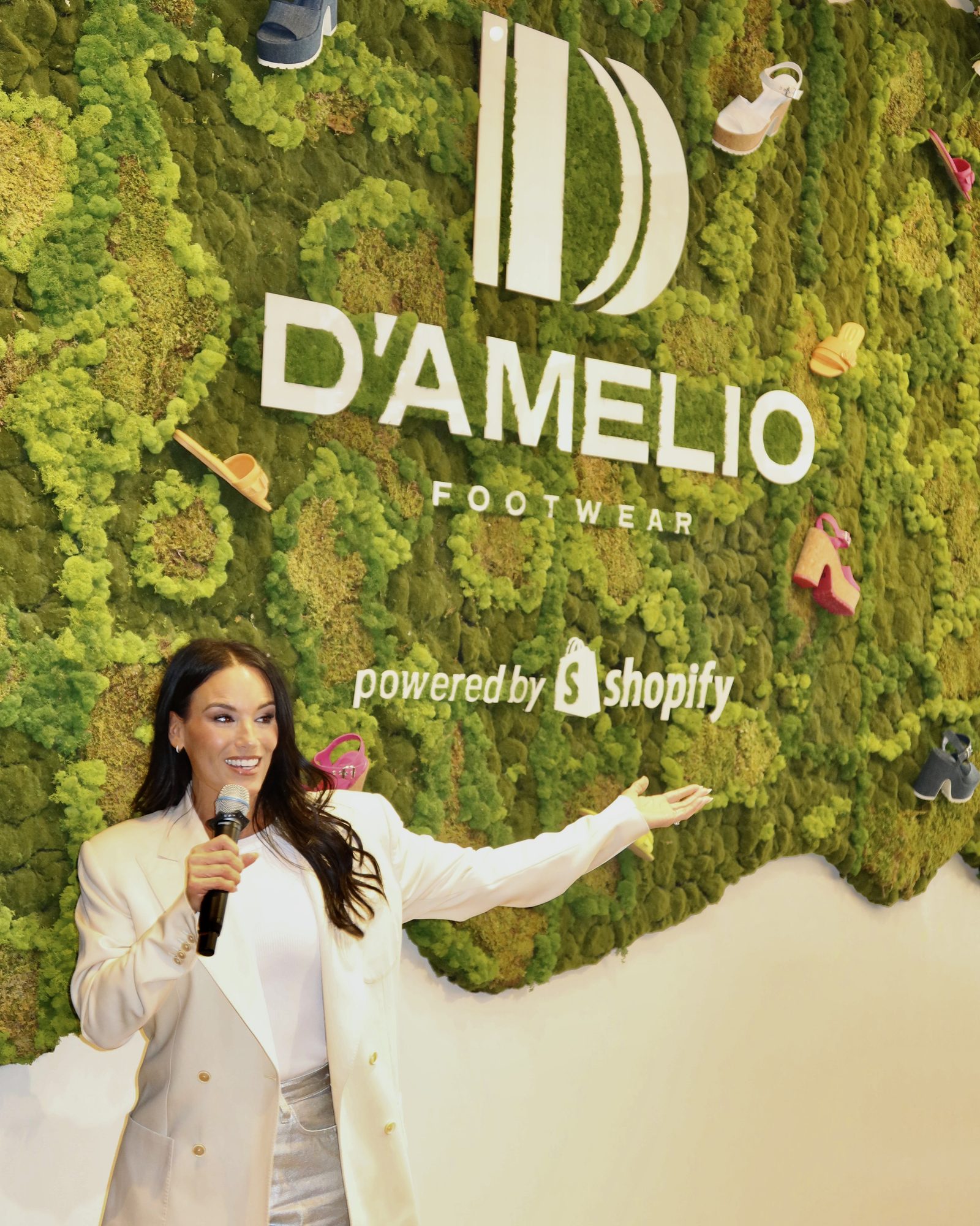 Heidi D'Amelio speaking at the D'Amelio Footwear launch