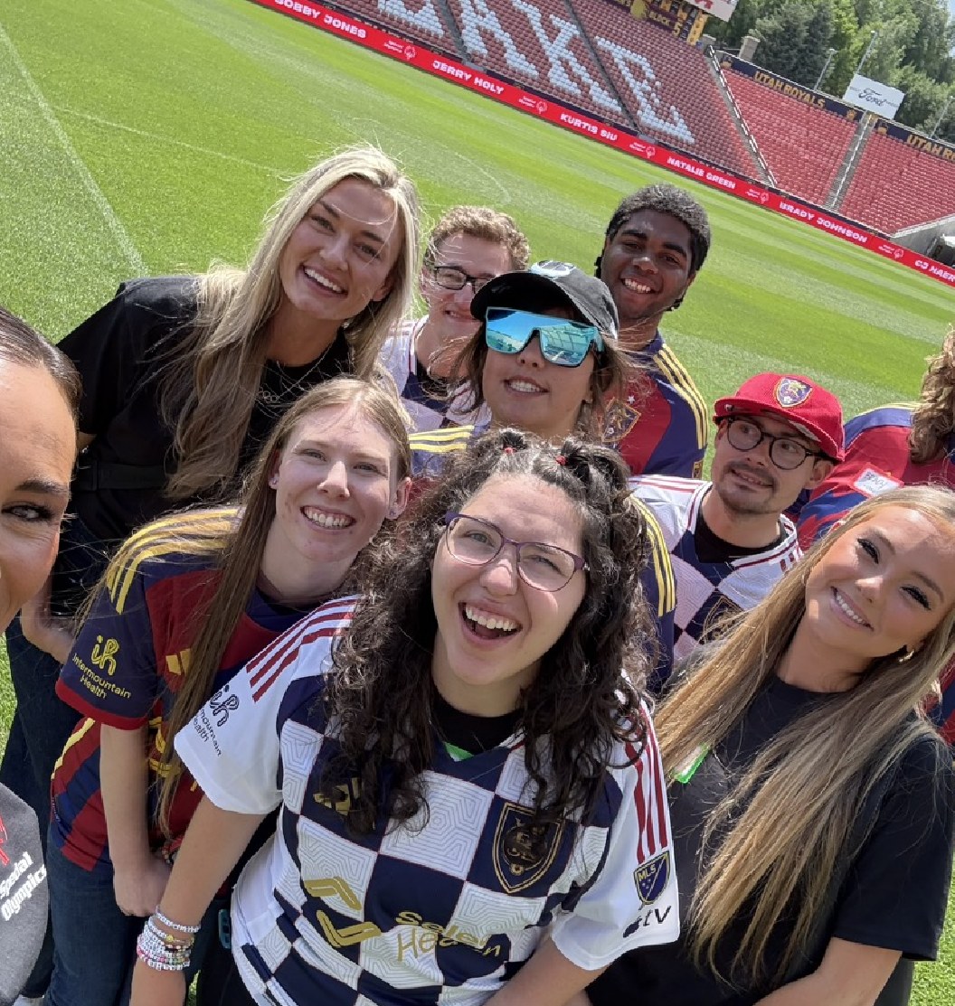 Heidi D'Amelio with Special Olympics athletes at the stadium