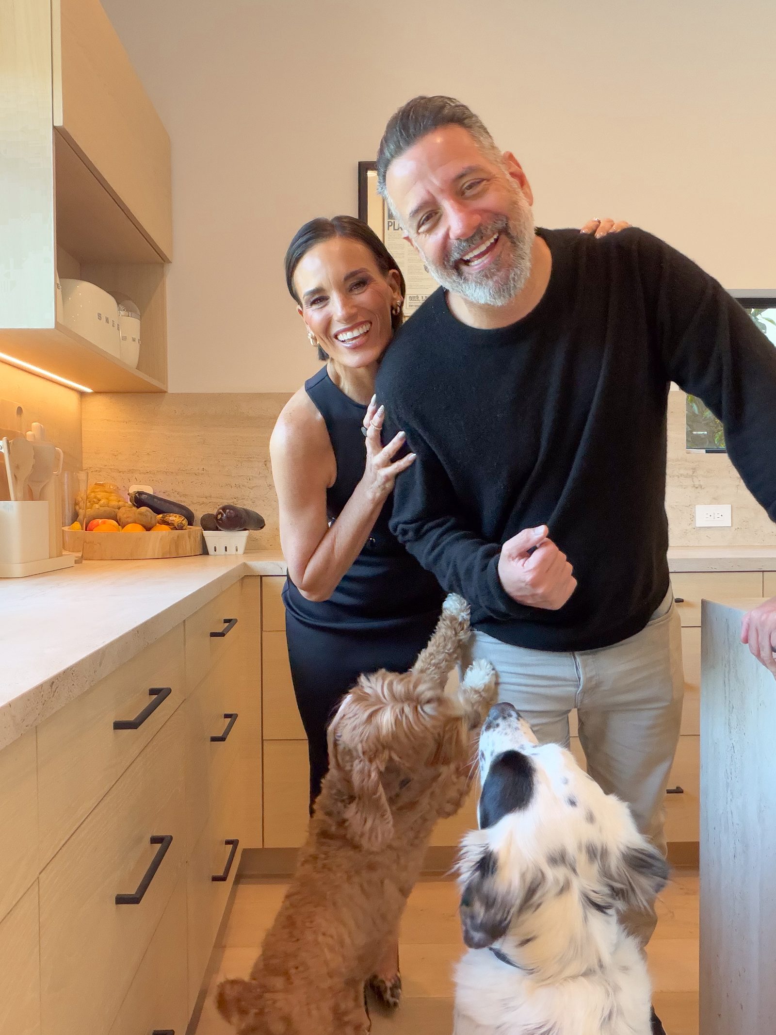 Heidi and Marc in the kitchen with the dogs